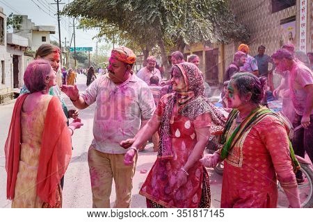 Vrindavan, India - March 21, 2019: Indian People In Different Colours Celebrate Traditional Holi Fes