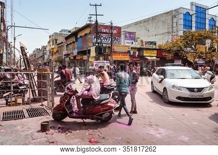 Vrindavan, India - March 21, 2019: Indian People In Different Colours Celebrate Traditional Holi Fes