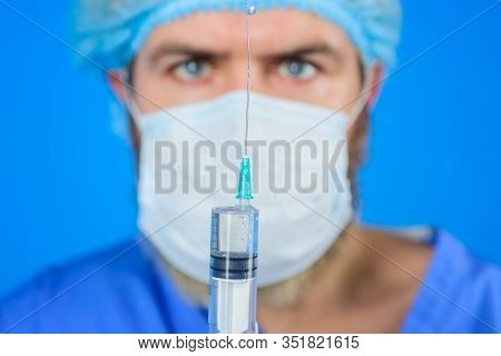 Doctor With Syringe. Vaccination For People. Injection. Coronavirus. Doctor Makes Vaccination. Selec