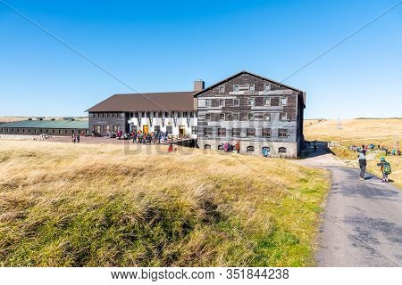Tourists At Lucni Bouda On Sunny Autumn Day In Giant Mountains, Krkonose National Park, Czech Republ