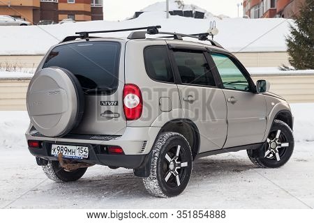 Novosibirsk, Russia - 02.18.2020: Rear View Of A Chevrolet Niva, A Russian-american Car In The Snow 