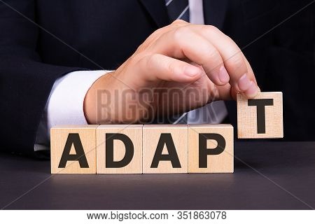 Man Made Word Adapt With Wood Blocks