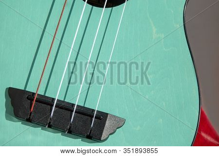 Close Up Of A Part Of Ukelele Guitar.