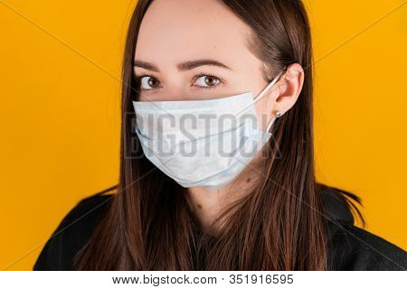 Girl in a medical mask. coronavirus. Health Protection Methods