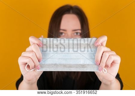 Girl in a medical mask. coronavirus. Health Protection Methods