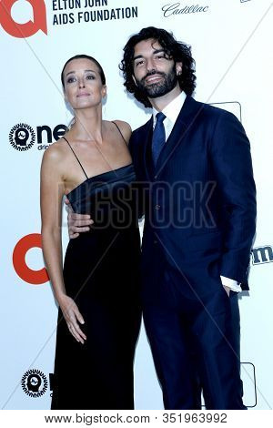 LOS ANGELES - FEB 9:  Emily Baldoni, Justin Baldoni at the 28th Elton John Aids Foundation Viewing Party at the West Hollywood Park on February 9, 2020 in West Hollywood, CA