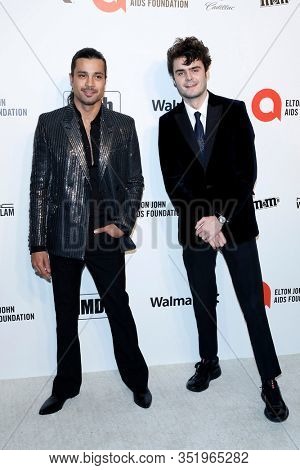 LOS ANGELES - FEB 9:  Andrewi GIllott, Duke Nicholson at the 28th Elton John Aids Foundation Viewing Party at the West Hollywood Park on February 9, 2020 in West Hollywood, CA