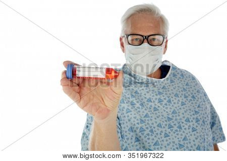 Coronavirus. Convid-19. A medical patient wears a face mask and holds a vile of blood with a CONVID-19 Label in his hand. A NO CORONAVIRUS image. Isolated on white. Room for text. Clipping Path. 