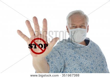 Medical or Hospital Patient with his hand as a STOP Sign. Man with the International NO Sign on the palm of his hand. Isolated on white. Room For text. Clipping Path. No Means No! No Coronavirus2019! 