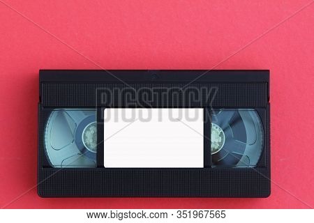 Stack Of Vhs Video Tapes As Background. Old Video Cassette Tapes. Retro Technology.
