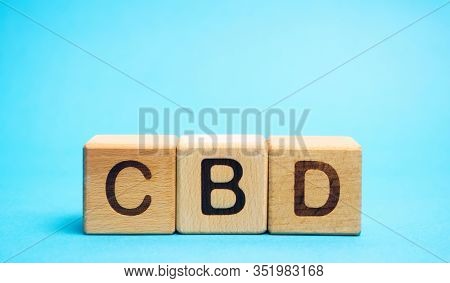 Wooden Blocks With The Word Cbd. Marijuana, Cannabis, Hemp. Concept Of Cannabidiol