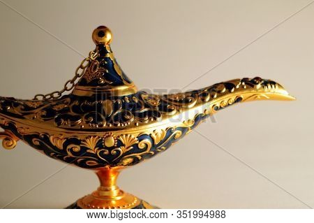A Closeup Image Of A Magical Genie Lamp Representing The Wealth Of Wish Fullfillment.