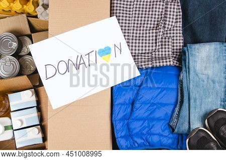 Donation For People From Ukraine. Donation Boxes With Clothing And Food. Volunteers Collect Donation