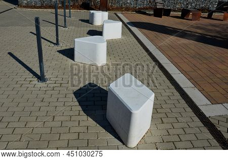 Smooth Concrete Chair-sized Castings. Suitable As An Urban Design Barrier To Enter The Pedestrian Zo