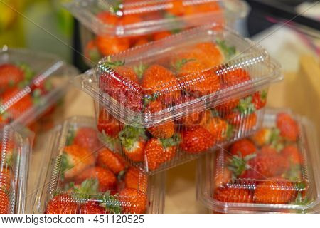 Fresh Strawberries Fruits In Tranparent Plastic Boxes