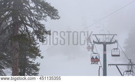 Ski Lift In The Fog, Winter Sports In Bad Weather. Mount Olympus Ski Resort, Cyprus
