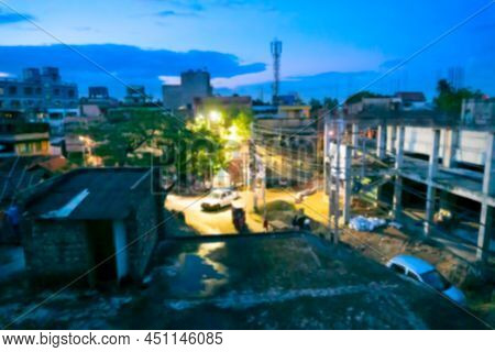 Blurred Image Of Howrah, West Bengal, India. View Of Howrah City In Blue Hour, Blue Sky And City Roa
