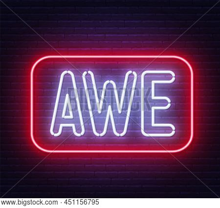 Neon Sign Awe On Brick Wall Background.