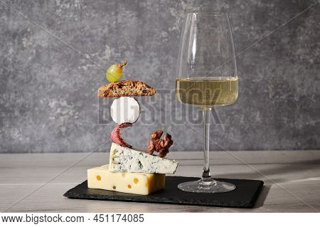 Concept Equilibrium Floating Food And White Wine Glass