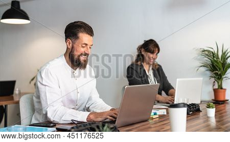 People Using Laptop In Coworking Creative Space