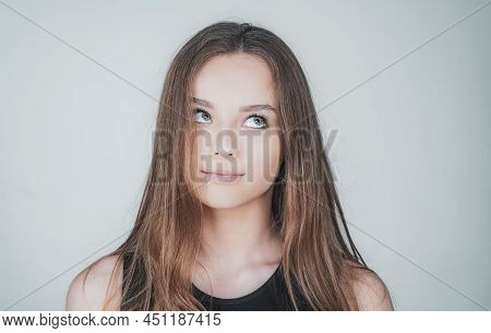 Close Up Portrait Of A Beautiful Young Woman With Blonde Hair. Caucasian Woman Model Posing Indoors.