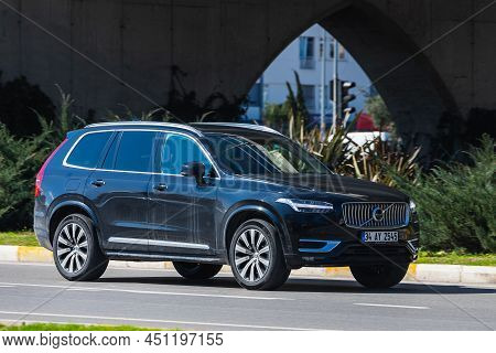 Antalya; Turkey - March 04 2022:  Black Volvo Xc90    Is Driving Fast On The Street On A Warm Summer