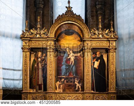 Venice, Italy - January 4 2022: Madonna With Child And Saints Triptych, Painted By Giovanni Bellini 