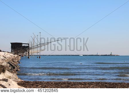Many Fishing Sheds On The Sea In Northern Italy Near Sottomarina Town In Venice Province