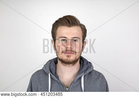 Portrait Of Young Man With Beart In Casual Clothes Looking Cool