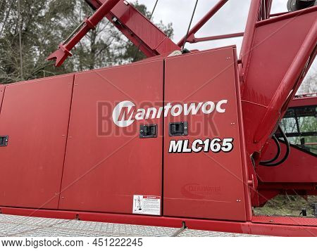 Augusta, Ga Usa - 03 19 22: Manitowoc Red Crane Construction Scene Cloudy Rainy Day Logo Mlc 165