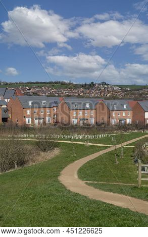 Grantham, England-march 17, 2022. Three Identical British Residential Buildings. Low Maintenance Red