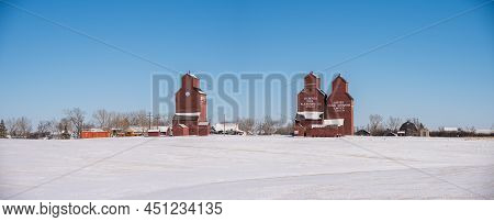 Rowley, Alberta - March 6, 2022: Grain Elevators In The Ghost Town Of Rowley In Winter.