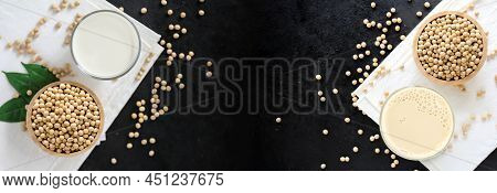 Soy Milk With Soybeans On Dark Background.
