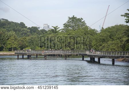 Singapore Dec 29 2021: View Of Bukit Chermin Boardwalk In Singapore. It Is Built On The Sea Along Th