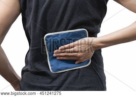 Woman Putting An Ice Pack On Her Back Pain On White Background, Healthy Concept