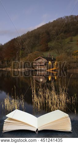 Stunning Sunrise Autumn Fall Landscape Image Of Ullswater In Lake District With Golden Sunlight In C