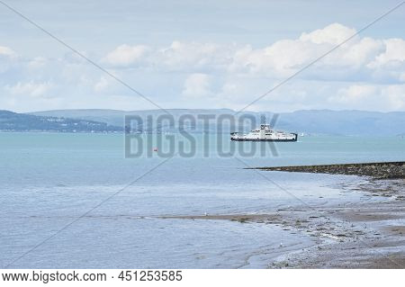 Ferry Ship Departing From Largs Sailing To Millport