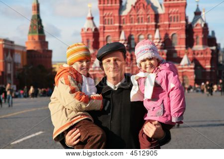 Grandfather With Grandson And Granddauther On Red Square