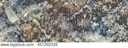 Pieces Of Broken Tempered Glass Lying On Paving Slabs Closeup Background. Car Accidents Concept