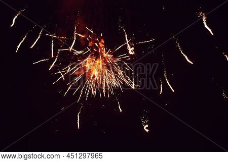 Firework. Celebratory Bright Firework In A Night Sky.