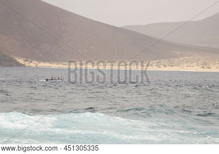 Chinijo Archipelago Natural Park, October 2, 2021: Boat Sailing Off The Northwest Coast Of La Gracio