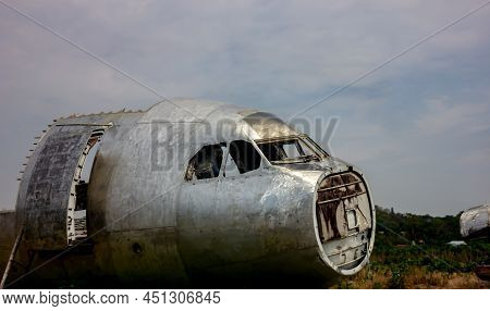 The Head Of The Crashed Plane Parked On The Open Ground.