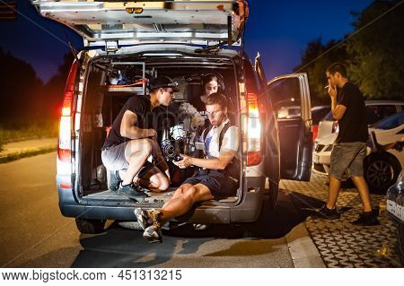 Behind The Scenes. Film Crew Team Shooting Movie Scene On Indoor Location. Group Filmmaking Set Prod