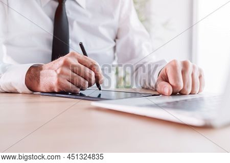 Businessman Signing Contract Agreement With Stylus Pen And E-sign Pad In Office, Selective Focus