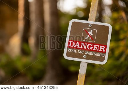 Danger Trail Not Maintained Sign In Yellowstone National Park