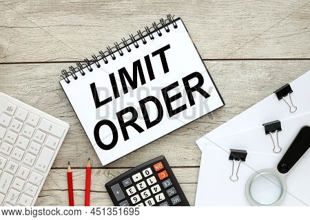 Limit Order. A Lot Of Stationery White Keyboard And Notepad With Text. Business Concept