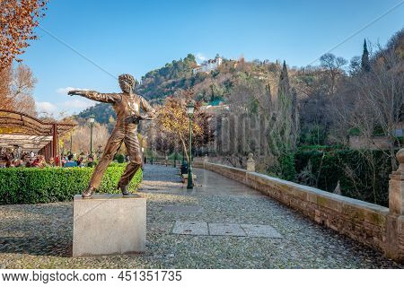 Granada, Spain - December 25 2014: The Statue Of Mario Maya In Albayzin, With Alhambra In The Backgr