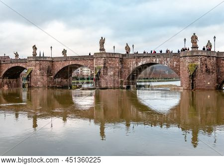 Wurzburg, Germany - December 23 2017: Evening View Of Alte Mainbrucke, The Medieval Landmark Of The 