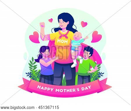 Mother Is Wearing A Superhero Cape And Holding A Baby. Supermom Celebrates Mother's Day With Her Kid