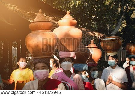 The Tradition Of Offering Alms To Monks And The Way Of Life Of The Mon People In Placing The Utensil